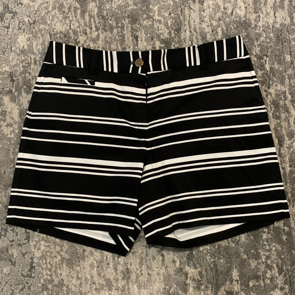 Black and white striped shorts.